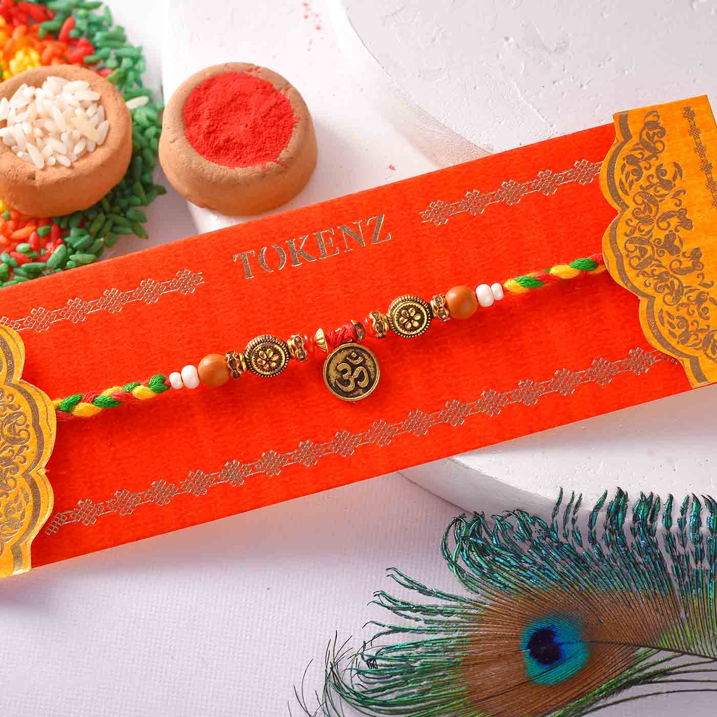 Auspicious Om Colourful Rakhi With Mauli Dori-12 Pcs Pack