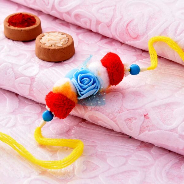 Sensational Floral & PomPom Rakhi - 12 Pcs pack