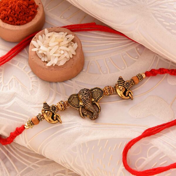 Antique Metal Ganesha Rakhi-12 Pcs Pack