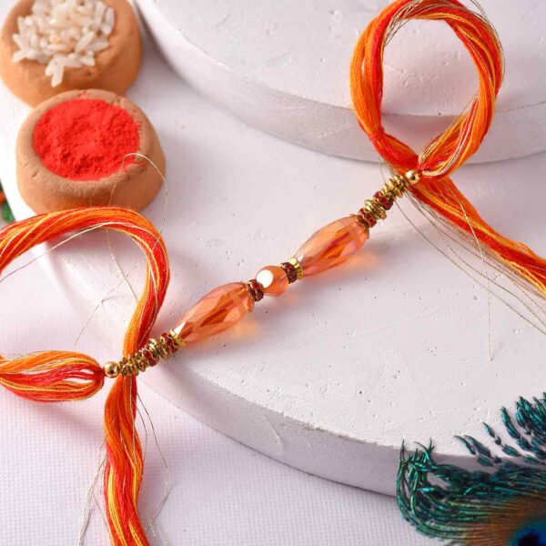 Premium Orange Beads Rakhi With Mauli Dori- 12 Pcs Pack