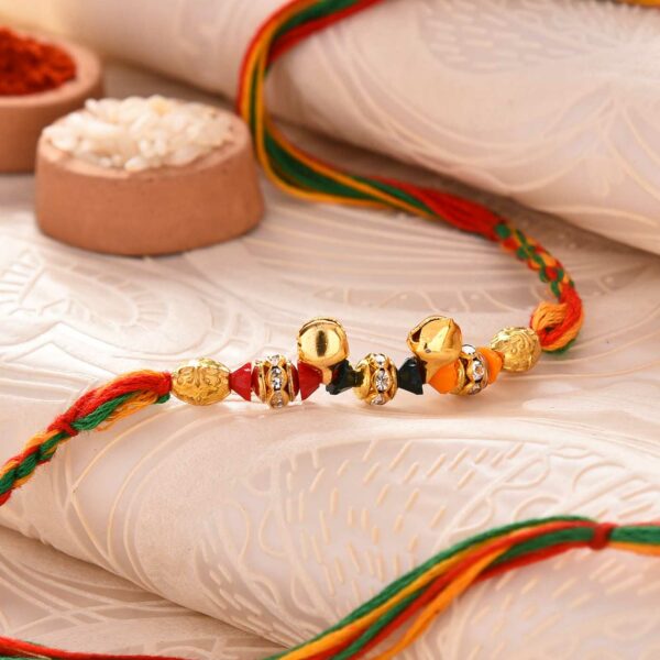 Gorgeous Ghungroo & Stones Rakhi - 12 Pcs Pack