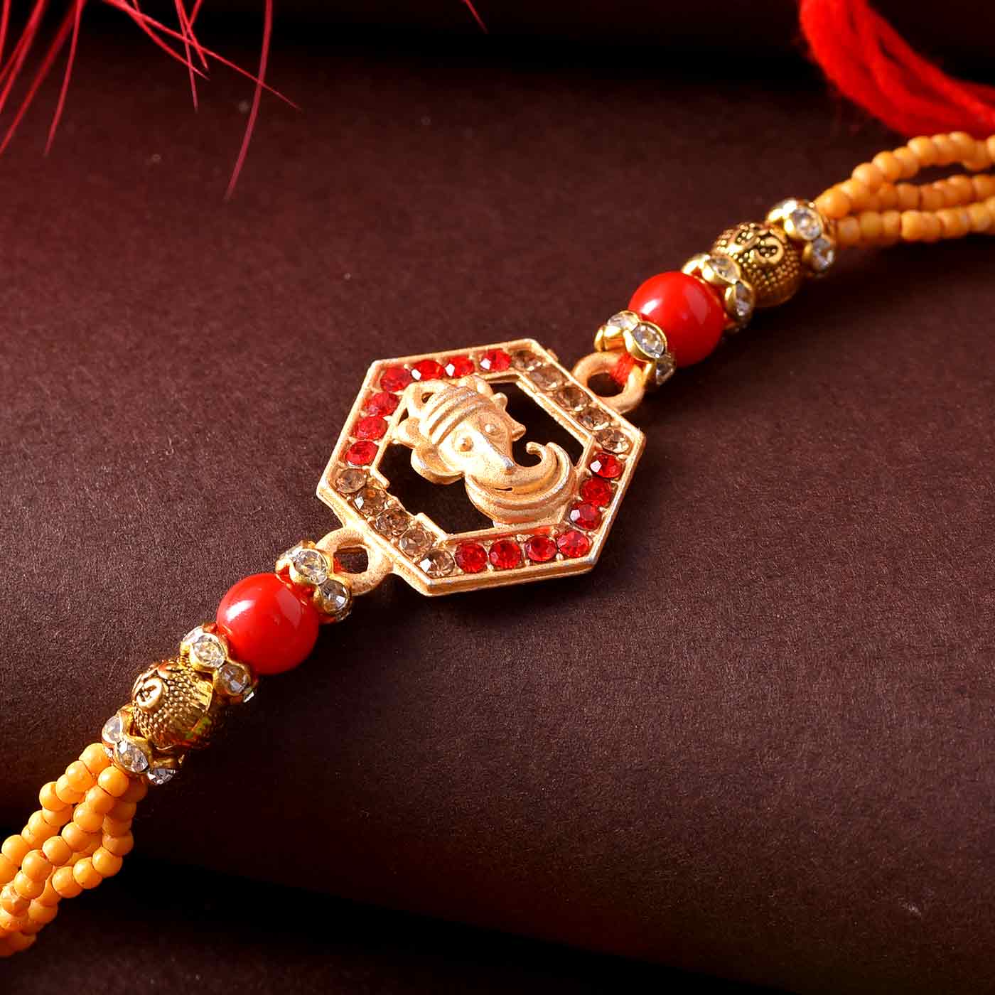 Lord Ganesha Rakhi - 12 Pcs Pack