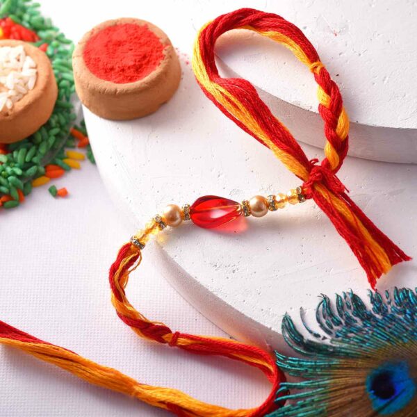 Traditional Pearl Mauli Dori Rakhi - 12 Pcs Pack