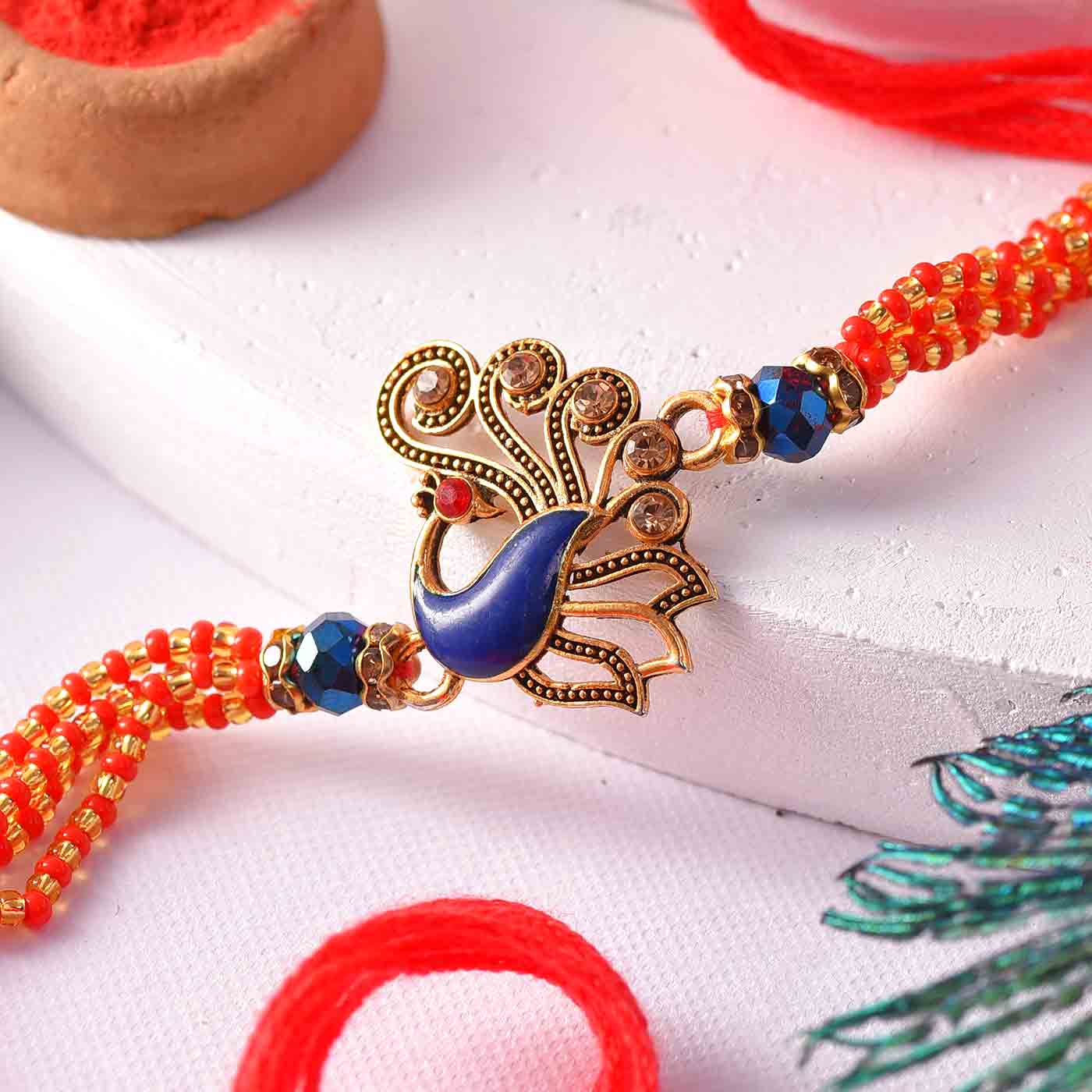 Designer Beads & Stones Peacock Rakhi - 12 Pcs Pack