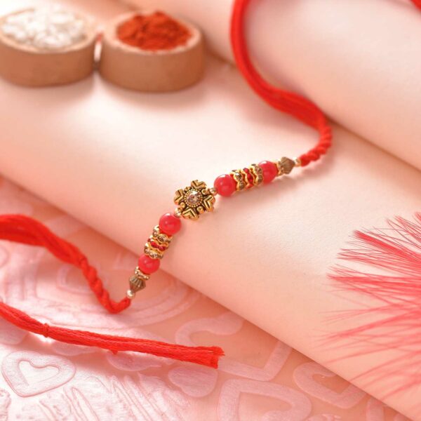 Floral Pattern & Red Beads Rakhi - 12 Pcs Pack