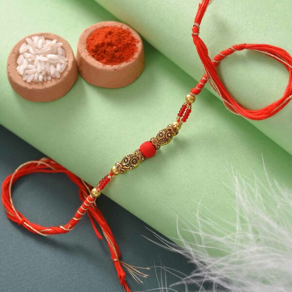 Metal Finish Red Beads Rakhi - 12 Pcs Pack