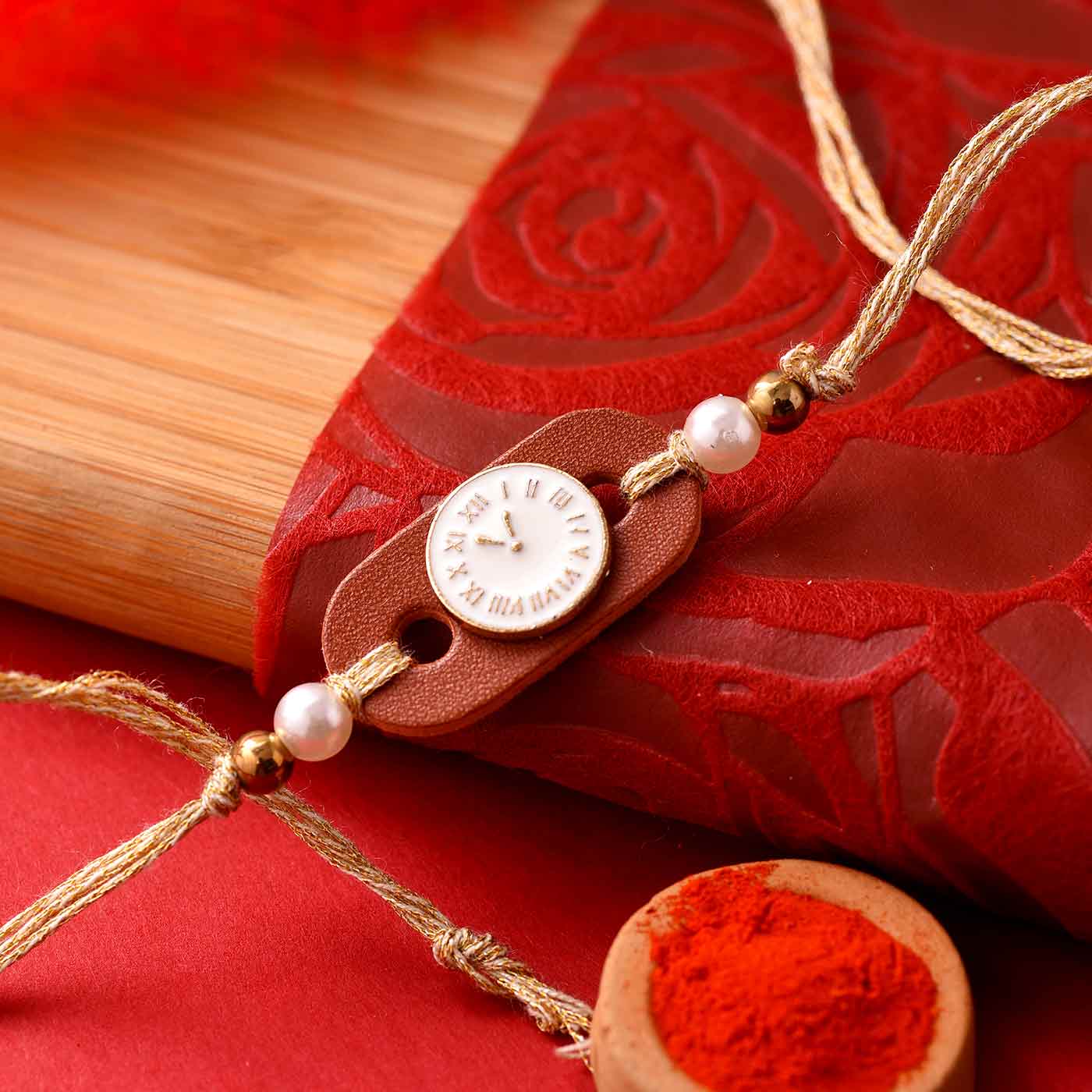 Awesome Timeclock, Beads & Pearls Rakhi - 12 Pcs Pack