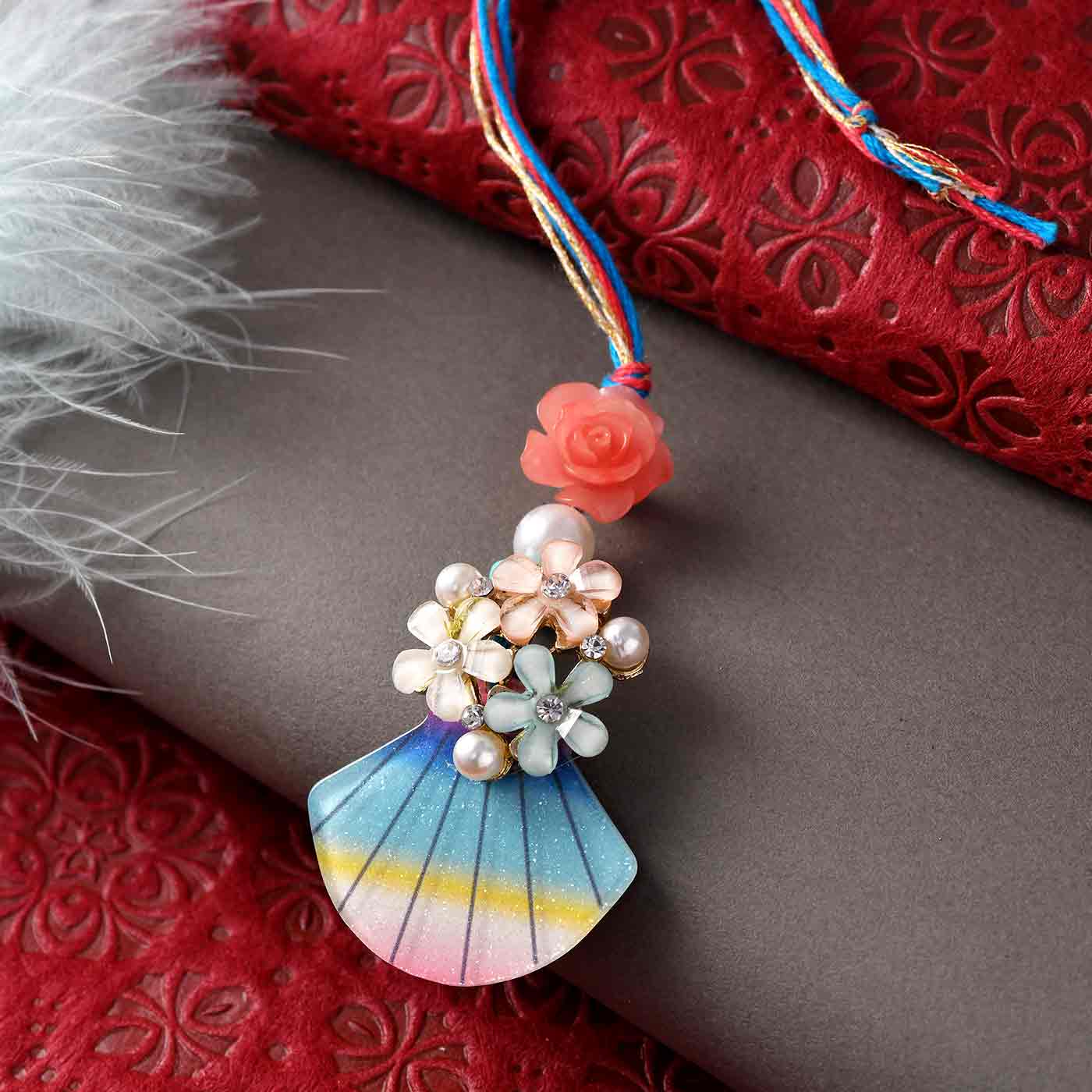Stylish Floral Pattern Pearls Lumba Rakhi- 12 Pcs Pack