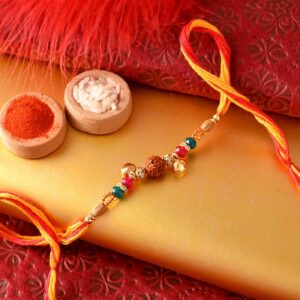 Rudraksh & Ghungroos Rakhi With Crystal Beads - 12 Pcs Pack