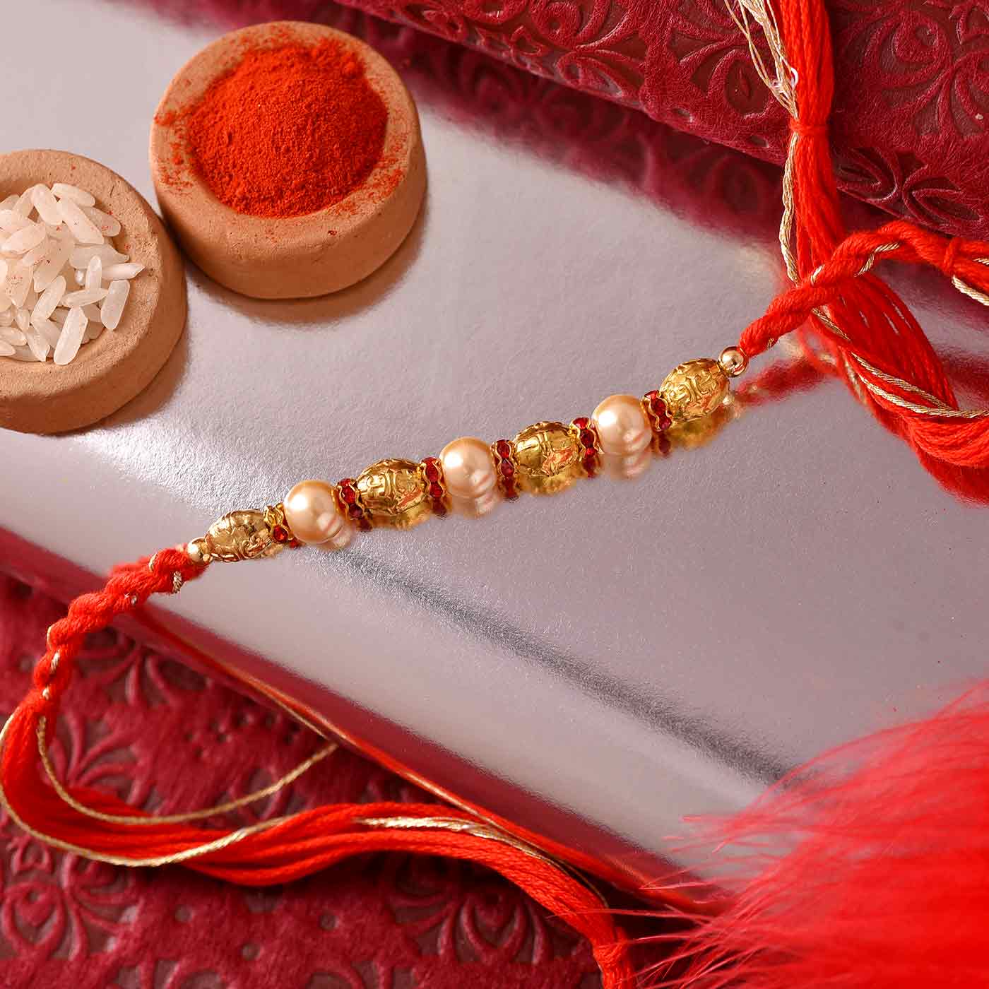 Gorgeous Pearls N Golden Beads Rakhi- 12 Pcs Pack
