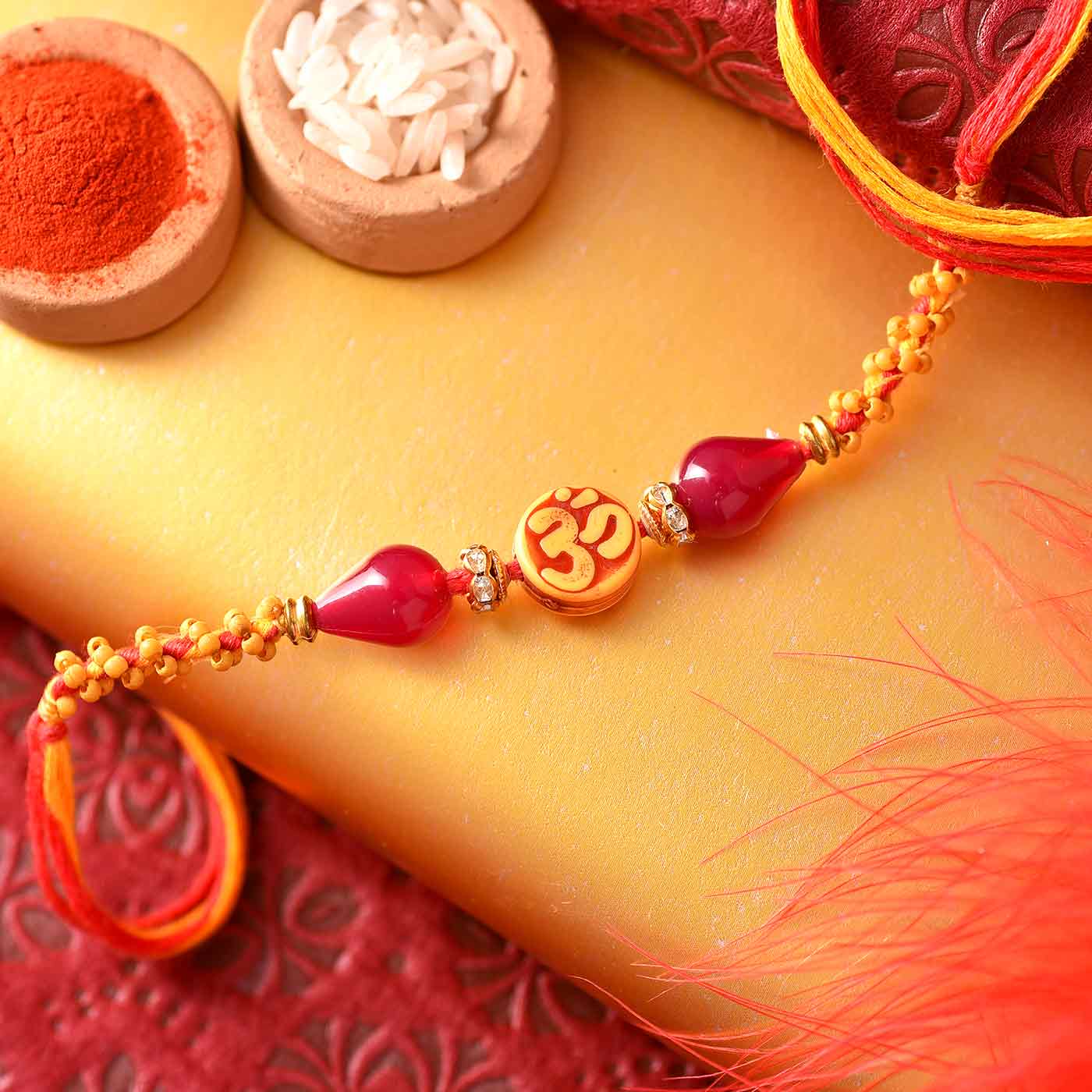 Traditional Om & Crystal Beads Rakhi Thread - 12 Pcs