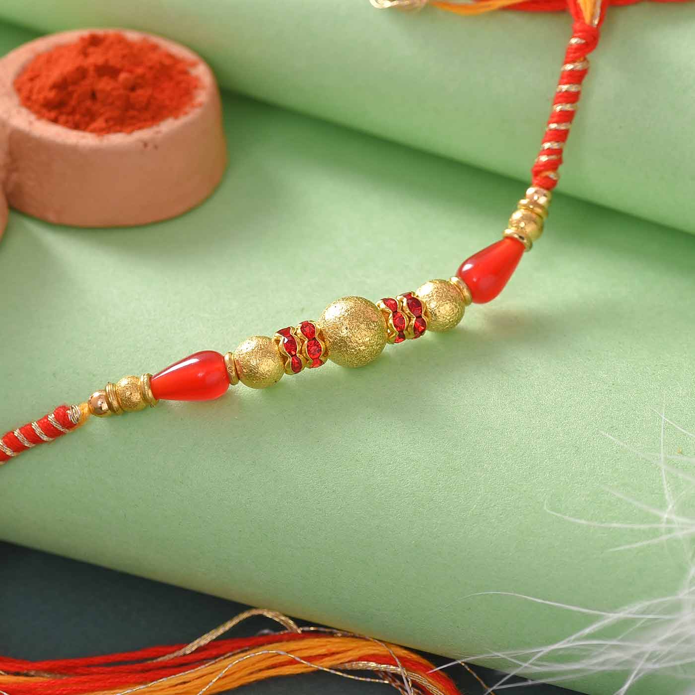 Beautiful Red & Golden Beads Rakhi- 12 Pcs Pack