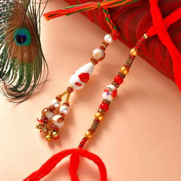 Stunning Pearls & Beads Work Lumba Rakhi Set - 12 Pcs Pack