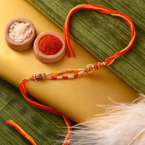 Traditional Wooden Finish Om Rakhi - 12 Pcs Pack