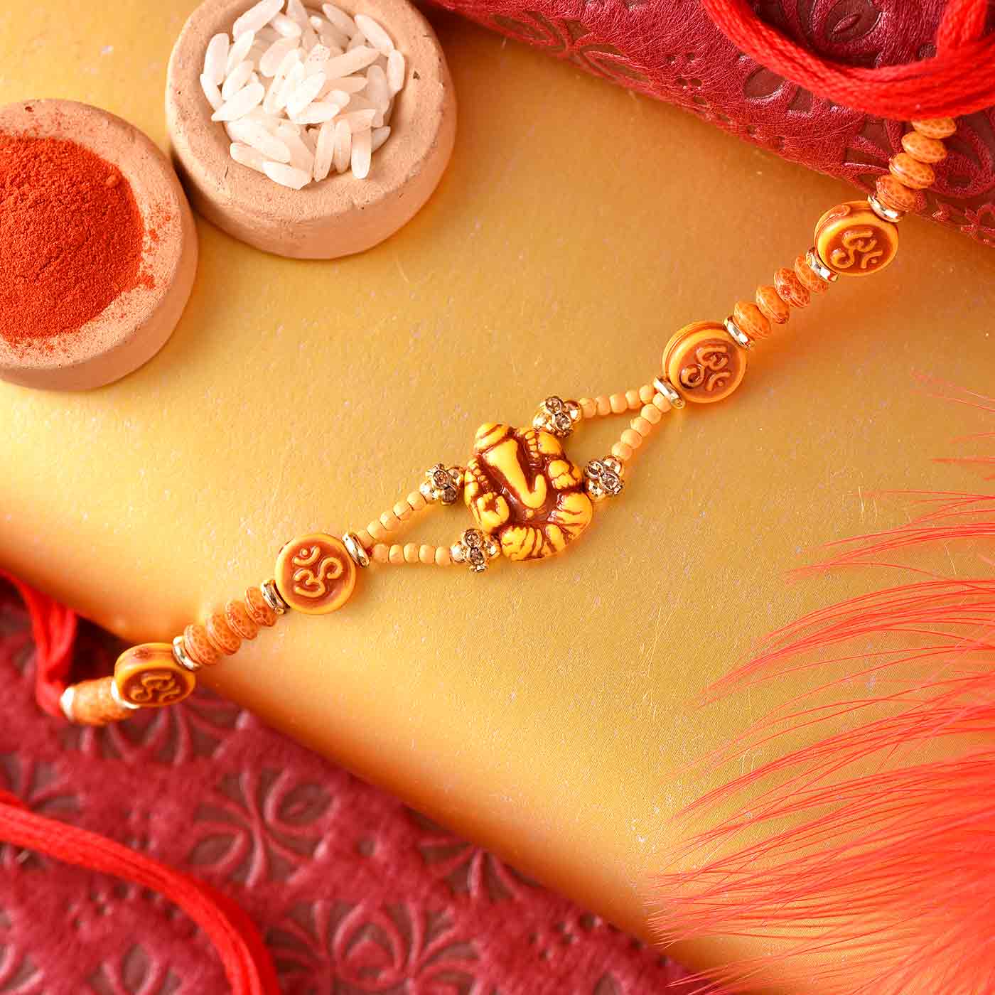 Om & Ganesha Rakhi - 12 Pcs Pack