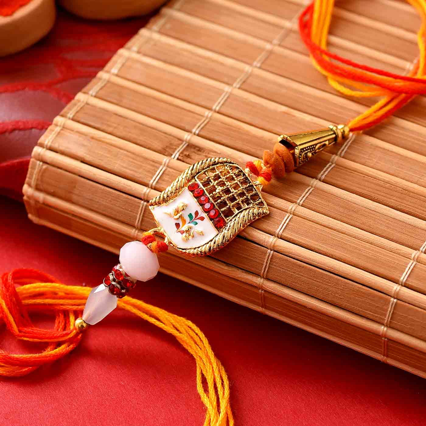 Jaal Work Meena Rakhi With Crystal Beads -12 Pcs Pack