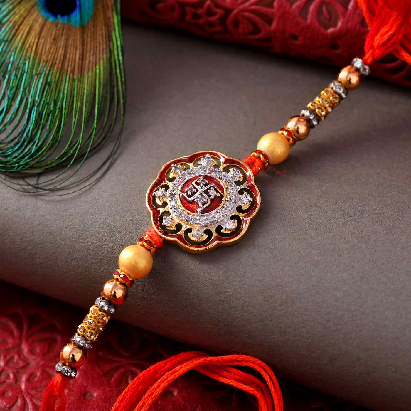 Floral Pattern Swastik Rakhi With Beads - 12 Pcs Pack