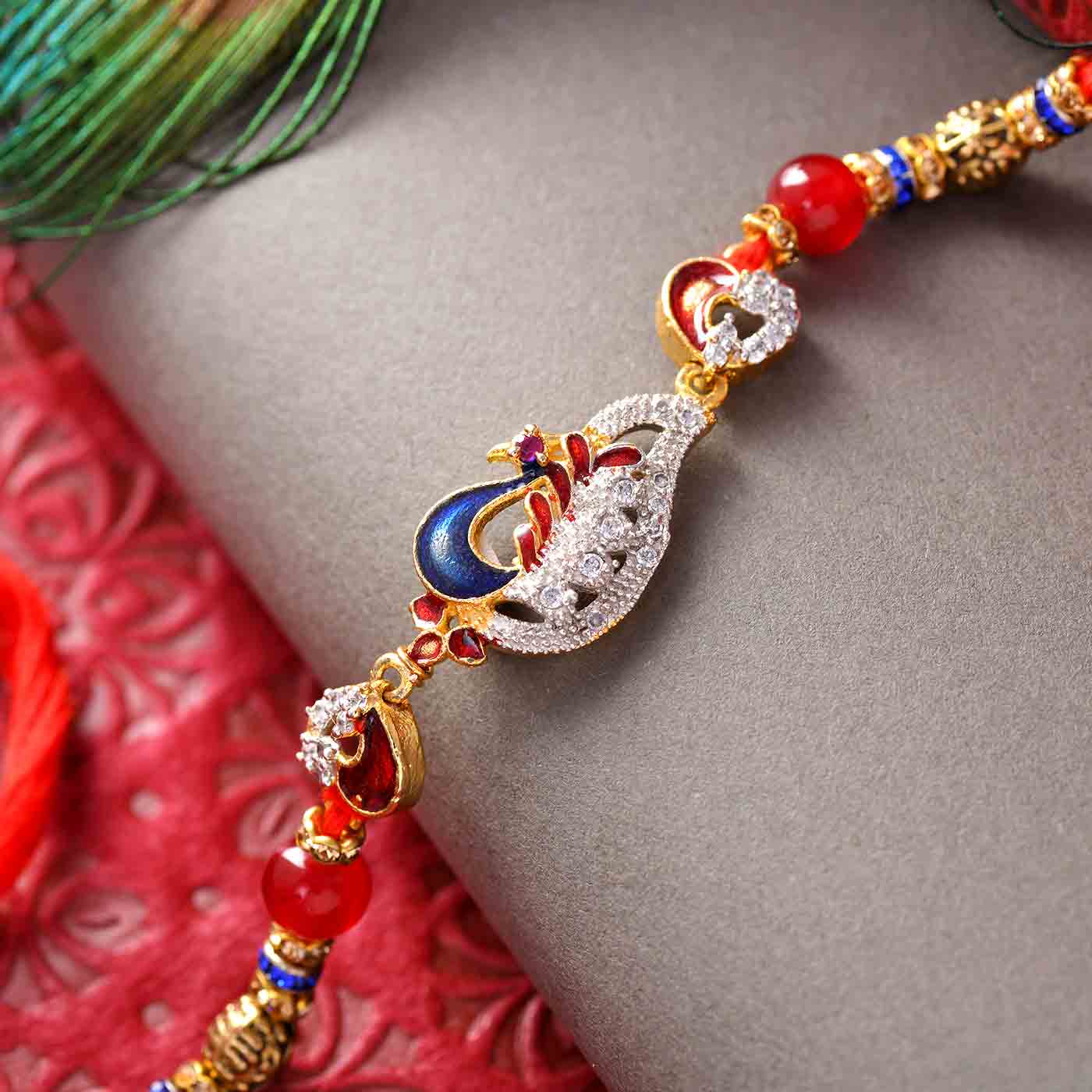 Exclusive Peacock Stone Work & Beads Rakhi - 12 Pcs Pack