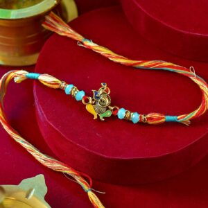 Blessed Ganesha Colorful Pearls & Mauli Dori Rakhi - 12 Pcs Pack