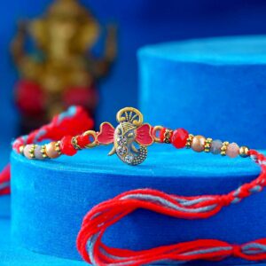 Meenakari Ganesha Face Pearl & Beads Rakhi - 12 Pcs Pack