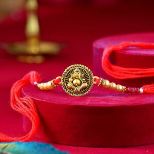 Golden Ganesha Dial Rakhi With Mauli Dori - 12 Pcs Pack