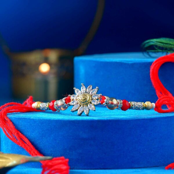 Floral AD Rakhi With Colorful Pearls & Mauli Dori - 12 Pcs Pack