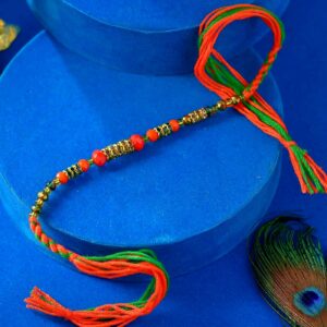 Traditional Orange Pearls & Glittering Stones Rakhi - 12 Pcs Pack