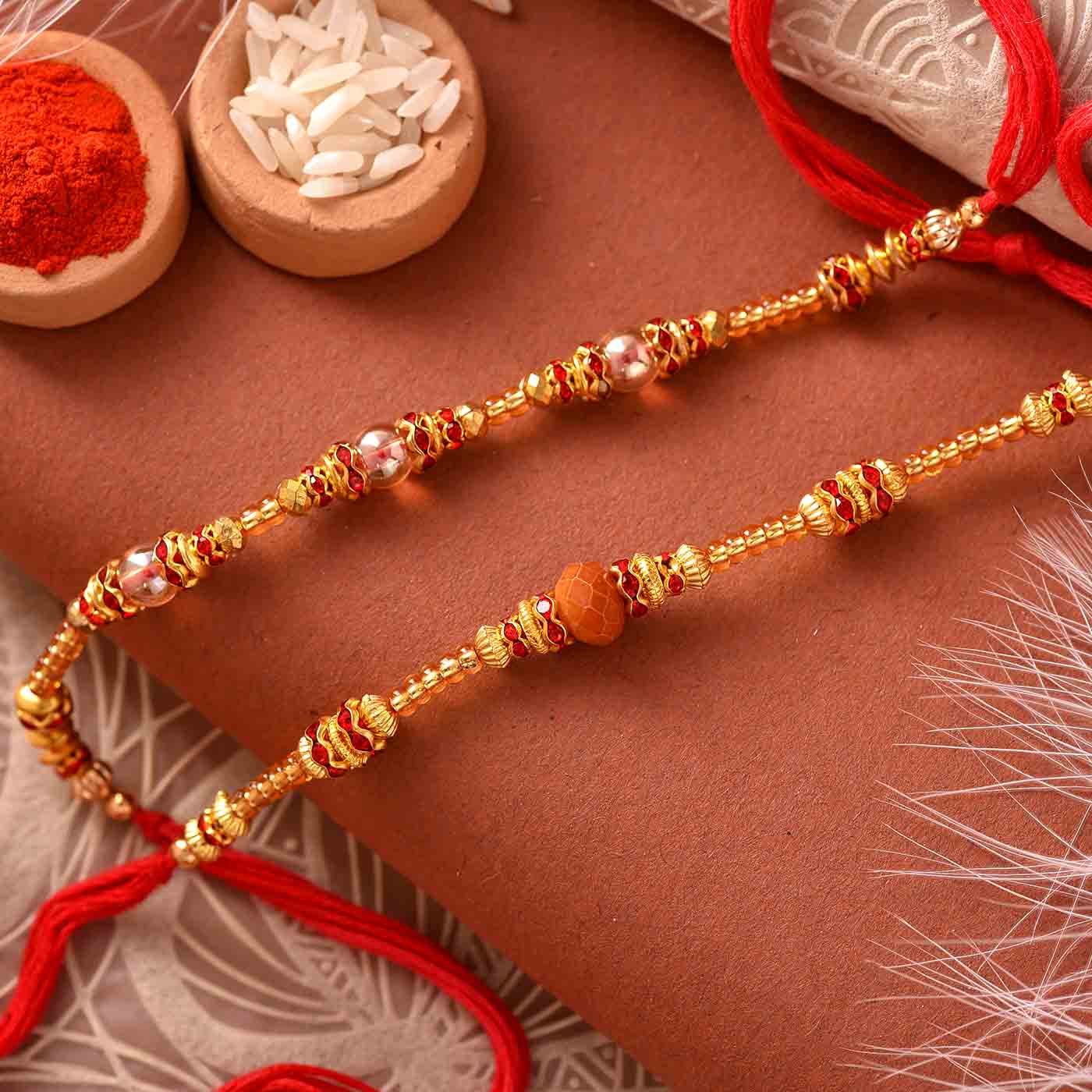Glittering Beads & Stone Work Rakhis Set Of 2 - 12 Pcs Pack