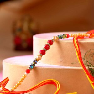 Dazzling Colorful Pearls,Stone & Mauli Thread Rakhi - 12 Pcs Pack
