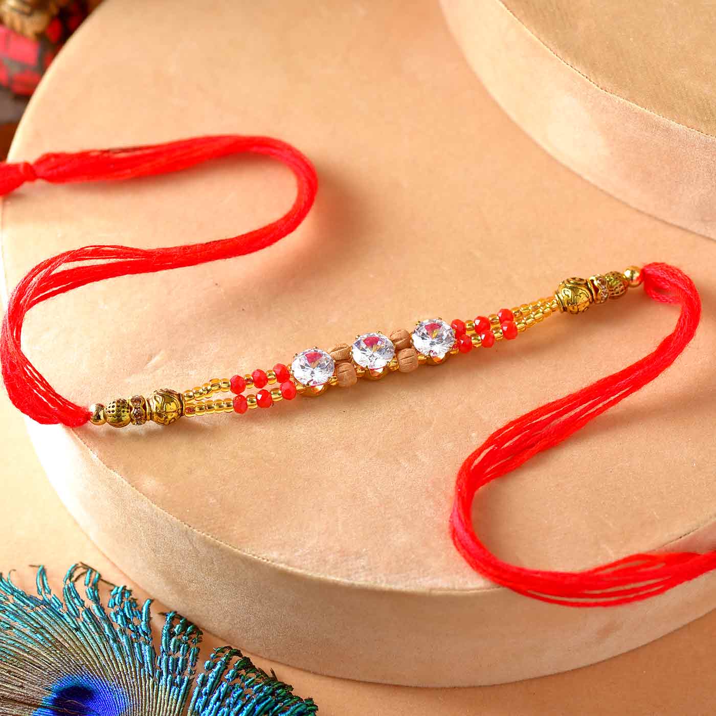 AD Rakhi With Pearl & wooden Beads – 12 Pcs Pack