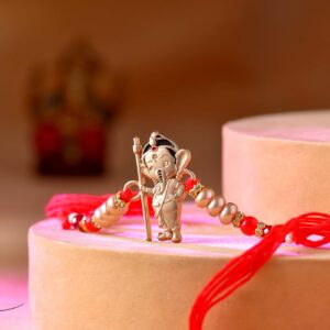 Cute Bal Ganesha Rakhi with Pearls - 12 Pcs Pack