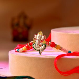 Designer Ganesha Rakhi With Colorful Pearls - 12 Pcs Pack