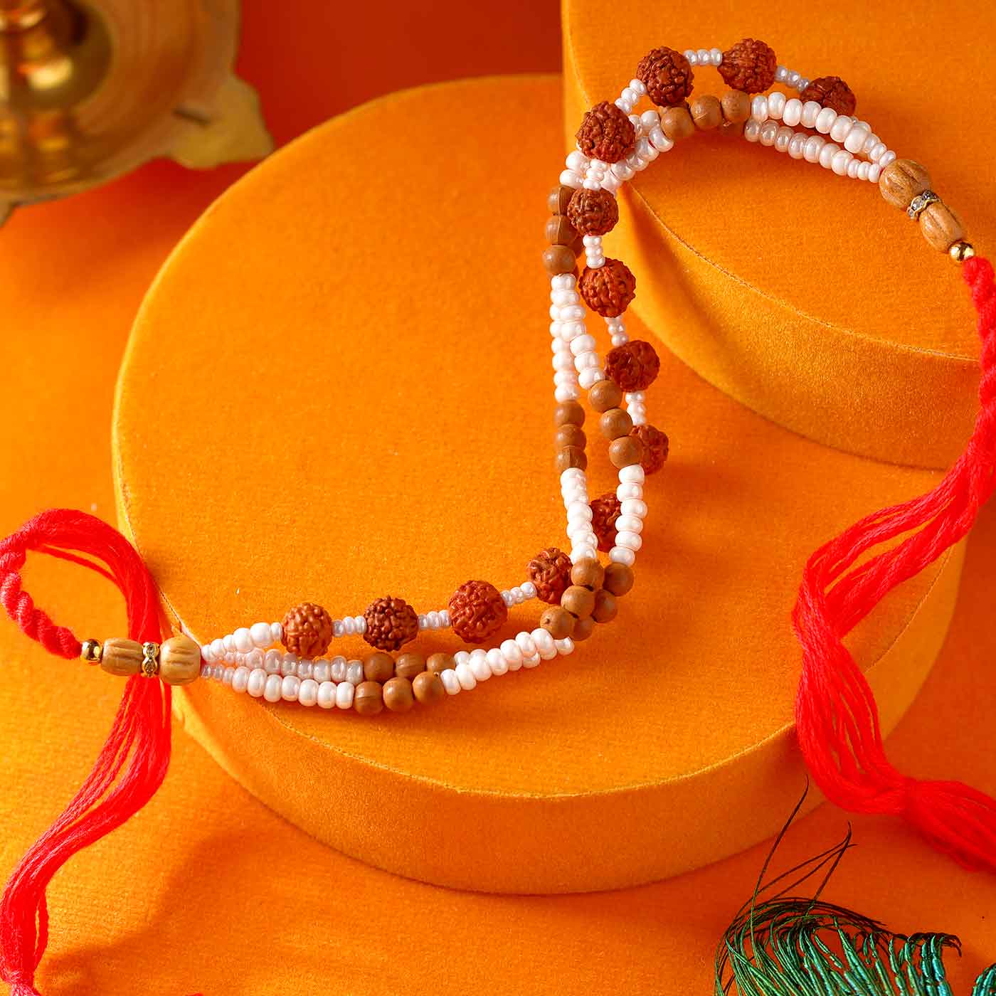 Admirable White Pearls , Multi Rudraksh & Wooden Beads Rakhi – 12 Pcs Pack