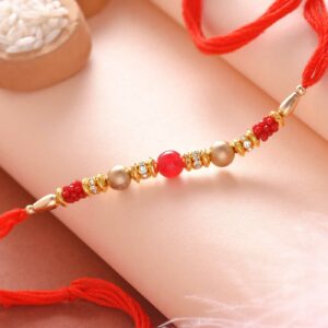 Amazing Red & Golden Beads Rakhi - 12 Pcs ack