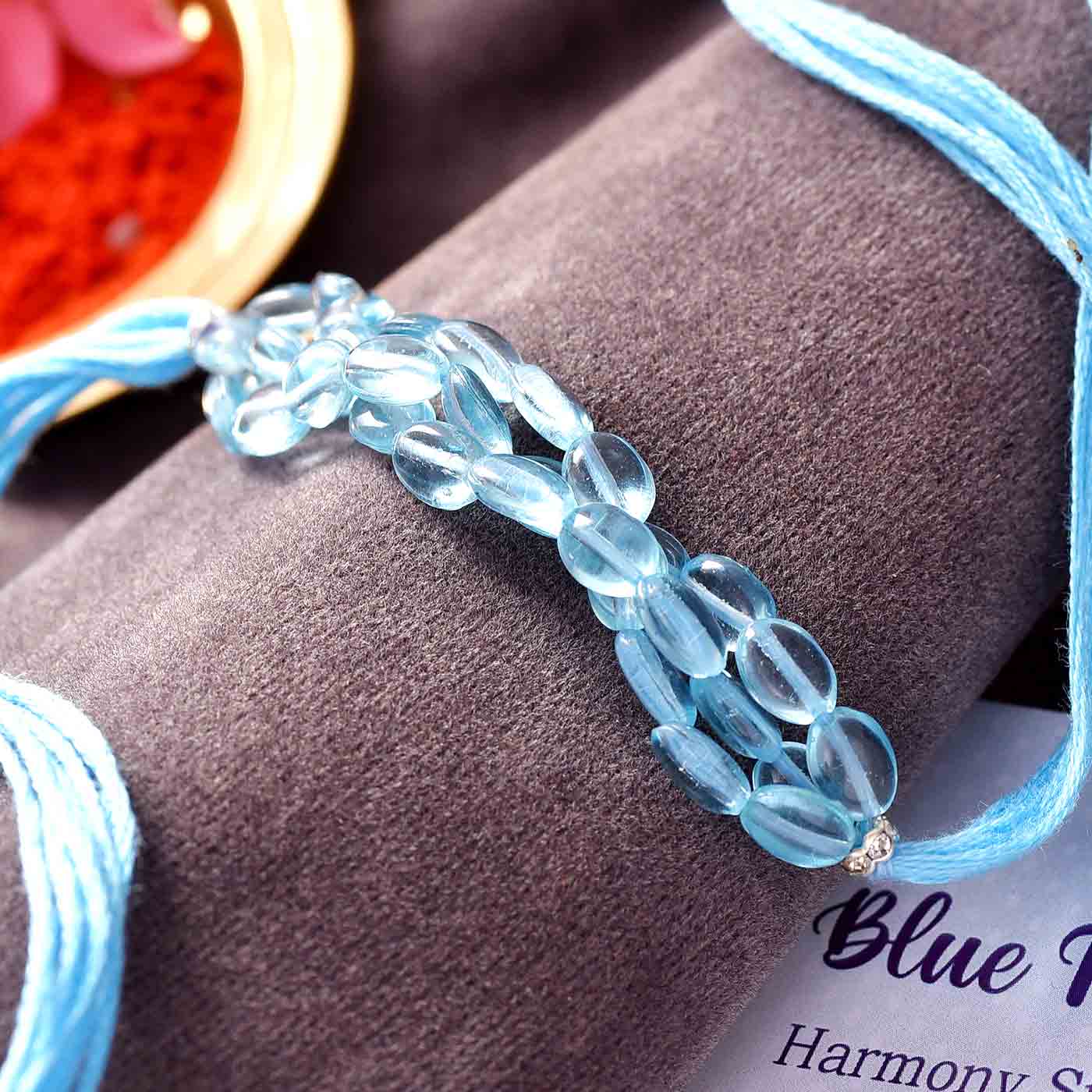 Semi Precious Harmony Stone Blue Topaz Rakhi - 12 Pcs Pack
