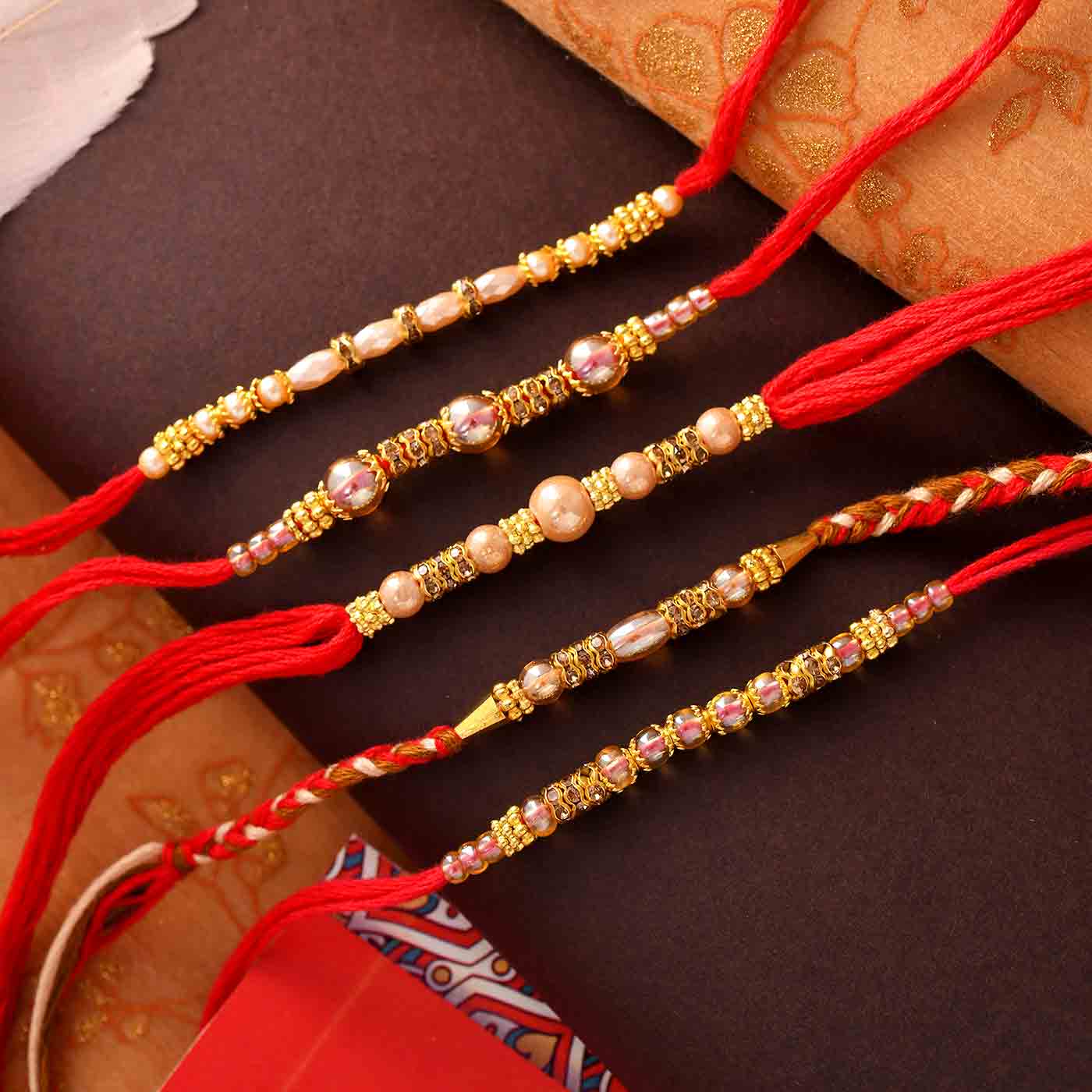 Elite Beads Rakhi Set Of 5 - 12 Pcs Pack