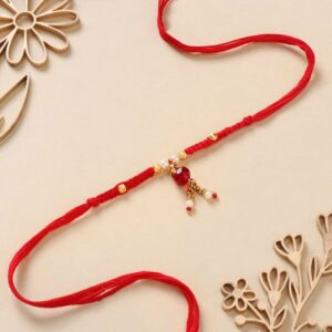 Radiant Red Stone And Pearl Rakhi - 12 Pcs Pack